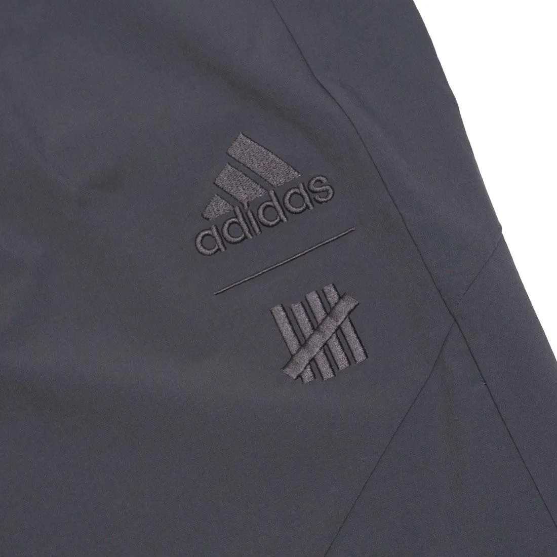 Adidas x Undefeated Men Outerwear Pants (black / utility black)